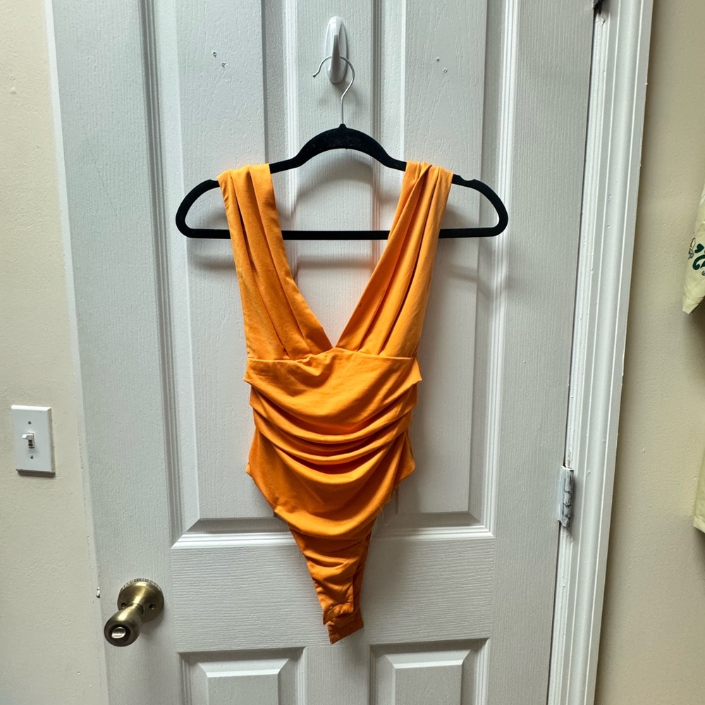 Thats So Fetch Orange Bodysuit